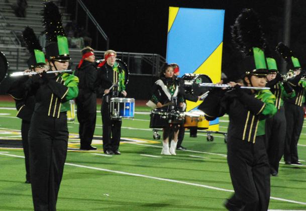 Sound of Dublin Band members perform their 'Ninja' routine