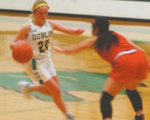 Dublin Lady Lion Naomi Dudley looks to bring the ball past Eastland Lady Mav defense in Friday night’ home game which resulted in a loss for the Lady Lions.. Paul Gaudette | Citizen staff photo
