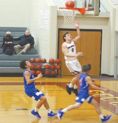 Lingleville Cardinal Casten Murphey takes to the air to sink a two against Gorman in Friday night’s 75-36 home victory. The Cardinals sat at 9-0 in district as they head into Tuesday night’s games. This also followed a 55-40 Huckabay defeat on Jan. 26. Sara Gann | Citizen staff photo