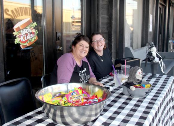 Mother and daughter duo Rachel Williams Maddry and Kailyn Williams recently opened Wich Kids inside Grafton Market (located at 118 S. Grafton, Suite C). They have been eagerly welcomed by the community and handed out candy at the downtown Trick or Treat event Thursday, Oct. 31. Wyndi Veigel-Gaudette | Citizen staff photo