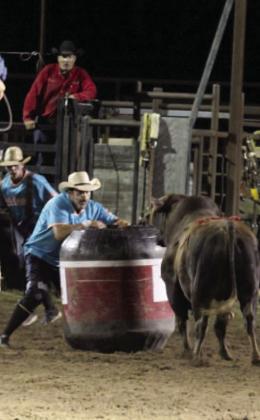A rodeo clown faces off against an upset bull during the bull riding event at the Dublin Rodeo. The bull was eventually ushered out of the arena thanks to rodeo clowns and cowboys working together. Wyndi Veigel-Gaudette | Citizen staff photo