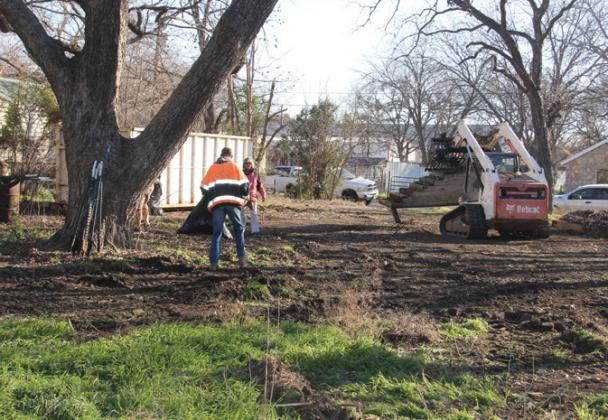 Despite extremely cold temperatures volunteers with Revitalize Dublin pick up trash after a property owner was left with a mess after the removal of a mobile home at 338 S. Camden. The property owner had paid several individuals to clean the property, but no one showed up to complete the job. ‘I prayed about it and they are an answer to my prayer,’ said property owner Michael McBrayer about the volunteers. Wyndi Veigel-Gaudette | Citizen staff photo