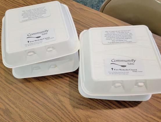 The last meals for Community Table, a community outreach event, get prepared to go out the door Wednesday, Nov. 29. Wyndi Veigel-Gaudette | Citizen staff photo