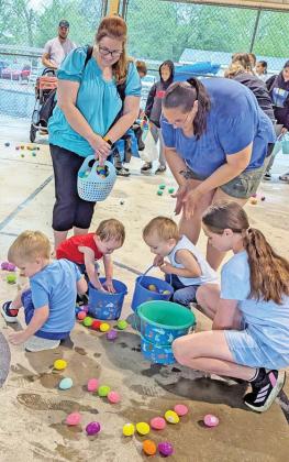 Kids sort through Easter eggs as they prepare to recycle the eggs for next year’s event. Paul Gaudette | Citizen staff photo