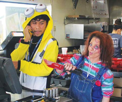 “Chucky” pals around with a minion at Dublin’s Sonic on Halloween. The Dublin business community was filled with colorful characters as people dressed up for the holiday. Paul Gaudette | Citizen staff photo