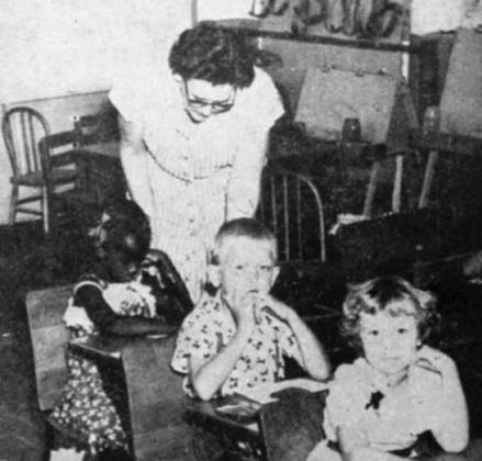 In 1955 Mrs. Grace Nichols is seen giving assistance to the school districts lone black student, Brenda Sue Johnson. Mrs. Nichols said that she is a well behaved student and eager to learn. Dublin Progress/Dublin Historical Museum