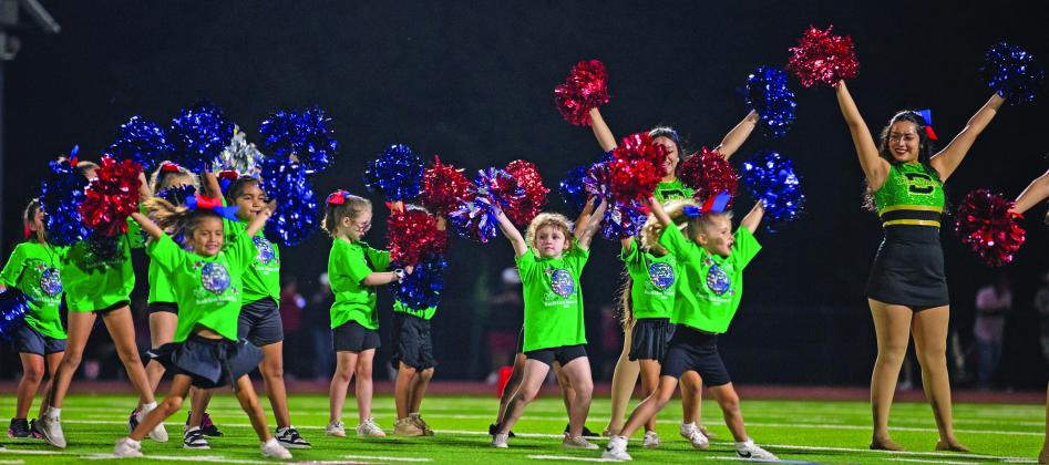 Dublin Dandi-Lion drill team members were aided at the home game Friday, Sept. 12 by a sea of small but spirited mini drill team members who got to show off routines they learned and help cheer on the Lions from the stands. Danielle Meador | Citizen staff photos