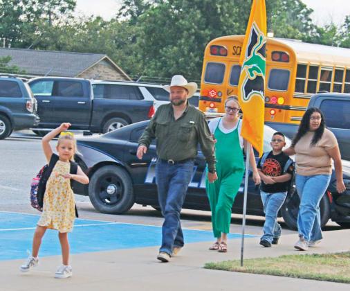Kids and parents make their way to Dublin Elementary School for the first day of school Tuesday, Aug. 12. Below, Shadrack and Dublin Cheerleaders welcome students to school. For more back to school photos see the Dublin Citizen Facebook page. Paul Gaudette | Citizen staff photo