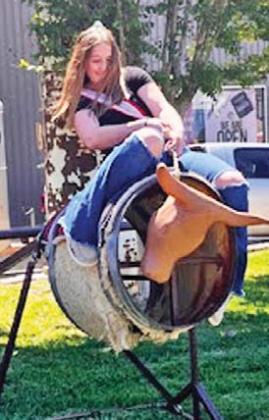 Ribbon cutting and barrel riding