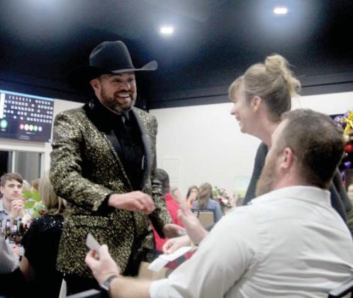 Emcee Ferron Lucero helps to check bingo cards at the annual CTFAC fundraiser dinner. There seemed to be a bit of confusion in what ‘Blackout’ meant in bingo terms leading to a wide array of laughter and confusion. The event raised more than $389,000 for the nonprofit. Wyndi Veigel-Gaudette | Citizen staff photo