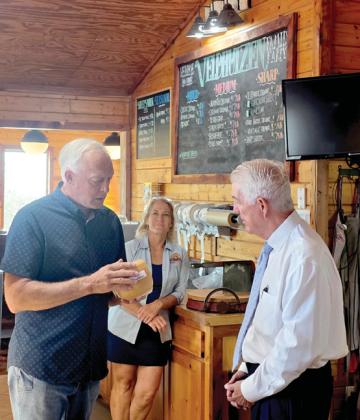 U.S. Rep. Roger Williams learns about the cheese making process from Stuart and Connie Veldhuizen who own Veldhuizen Cheese with their family outside Dublin. Wyndi Veigel-Gaudette | Citizen staff photo