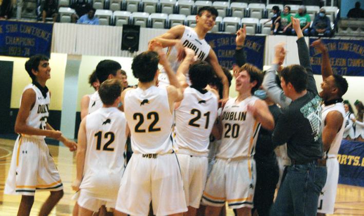 Lions celebrate claiming the Area championship on Feb. 24