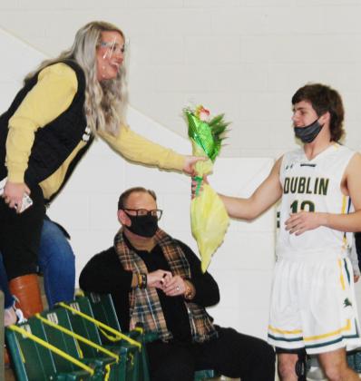 Players honored Dublin Secondary Counselor Leah Parker, presenting her with flowers for her support during their high school careers.