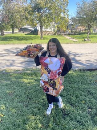 First place went to Hannah Vargas dressed as a charcuterie board. She will receive $25 from the Dublin Chamber of Commerce.