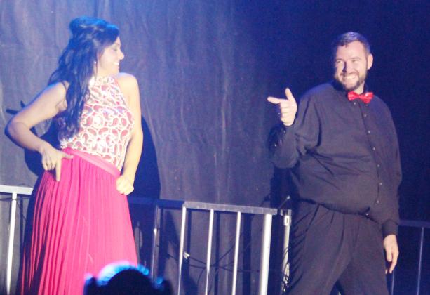 Darrell Curry of Team C2 called out to his partner Kayla Conner during their routine at the 2023 Big Brothers Big Sisters Dancing for the Stars fundraiser Nov. 9, 2023, at the Tarleton rodeo arena.