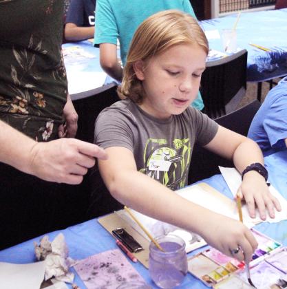 Kids of all ages enjoyed a week of art camp in July 2023 led by instructor Sarah Warner Svadlenka at the Dublin Public Library last week. Svadlenka opened up the world of water-colors, leading them through themed exercises like space scenes and encouraging them to work on original pieces in between exercises.