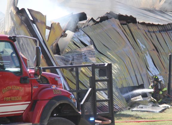 A firefighter battles a blaze at Veldhuizen Cheese Oct. 20, 2023. The machinery shop was a complete loss and according to Erath County Fire Marshal Tommy Shelton, fire was accidental. Departments including Dublin VFD, Erath County VFD, Lingleville VFD, Selden VFD, Stephenville Fire Department, Dublin EMS, Harbin VFD, State Troopers and Erath County Sheriff’s Office all responded to the fire as smoke could be seen all the way into Dublin. The retail space was undamaged and remains open.