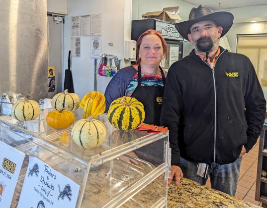 Marcia and Ryan Raborn of Dublin Golden Chick were up early Thanksgiving day preparing and packaging meals for those who needed them.