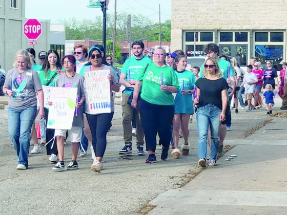 Advocates against violent crimes marched around the Erath County courthouse at Stop the Silence in observance of National Crime Victims’ Rights Week, held April 21-27, 2024. Stop the Silence is an annual event organized by Cross Timbers Family Services to allow community members to stand together against violent crimes.