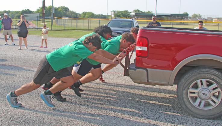 DHS Lions football players team up and encourage each other through events at the lineman challenge Thursday, May 29, which included pushing a truck, bench press and flipping a tire down field and back. The team is headed to state competition at Hardin-Simmons University June 21 but will first make an appearance at Comanche for a challenge tournament Thursday, June 5 at 6 p.m.