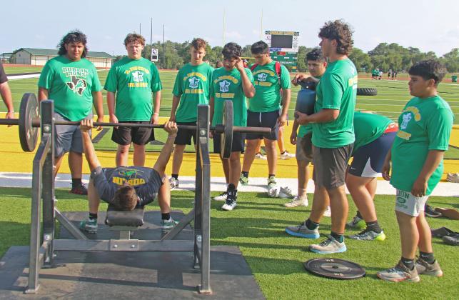 DHS Lions football players team up and encourage each other through events at the lineman challenge Thursday, May 29, which included pushing a truck, bench press and flipping a tire down field and back. The team is headed to state competition at Hardin-Simmons University June 21 but will first make an appearance at Comanche for a challenge tournament Thursday, June 5 at 6 p.m.