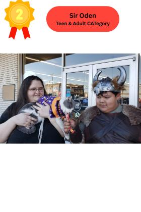 2nd place - Sir Oden (A cat and owner who helped pass out Halloween treats)