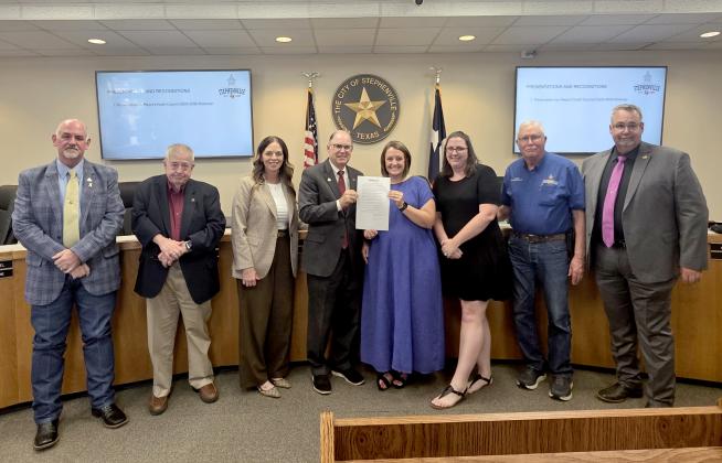 City Secretary Sarah Lockenour is presented a proclamation for Municipal Clerk's week.