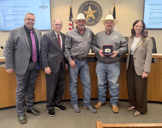 The city was presented with a belt buckle and award for being a lead sponsor at the Cowboy Capital Rodeo.
