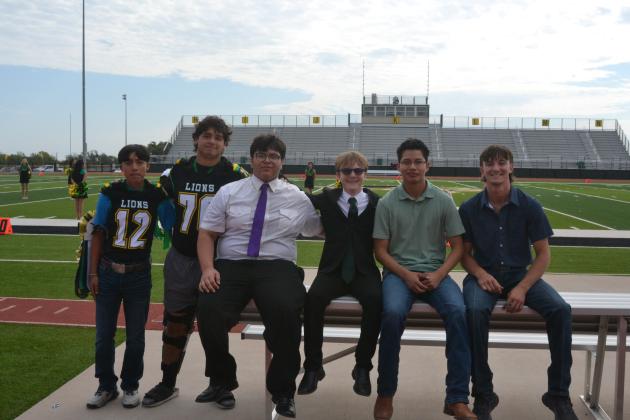 Homecoming king candidates and class representatives line up at the Sept. 11 community pep rally.