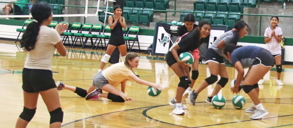 Young athletes rush for a ball during the DHS volleyball camp June 16-18. The summer camp held in cooperation with Sky High volleyball taught girls from kindergarten through 8th grade the basics of the sport and had them compete in games that utilized those skills. Wyndi Veigel-Gaudette | Citizen staff photos