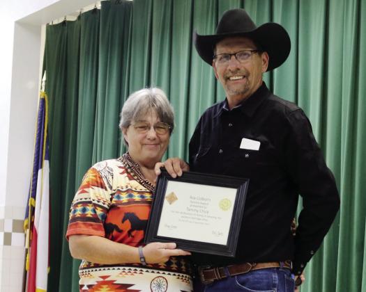 Tammy Chick from Dublin receives the Ava Colburn Service Award Saturday, Sept. 13 from museum organizer Rick Taylor. Wyndi Veigel-Gaudette | Citizen staff photo