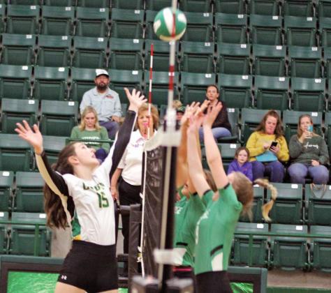 Dublin Lady Lion Jackie Gibson leaps up to meet Breckenridge Lady Buck at the net during the Lady Lions’ last game Oct. 25. Before the game, the team’s senior players and parents were honored in a Senior Night procession. Escorted across the floor were: Aylin Chacon, Libby Turner and Madilyn Loper. Paul Gaudette | Citizen staff photos