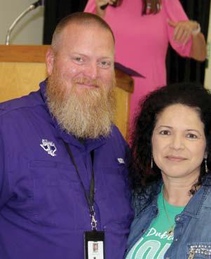 Coach Shawn Bradford received a Lion Heart award for his students earning 100% on 2024 U.S. History End-of-Course state testing. Principal Norma Briseño presented him with the award. Wyndi Veigel-Gaudette | Citizen staff photo