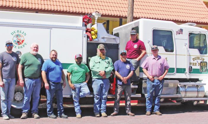 Members of the Dublin Volunteer Fire Department pose before being treated to special lunch Sunday. Members of the crew were busy this past week fighting fires, including the Eastland Complex, which included a downtown Ranger fire which destroyed the Second Baptist Church (below, in submitted photo by James Elliott). Paul Gaudette | Citizen staff photo