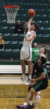 Dublin Lion Hunter Jones takes to the air for two points in a recent home game. Jones led the Lions in scoring in the team’s Dec. 9 game against Hico with 14 points. Paul Gaudette | Citizen staff photo
