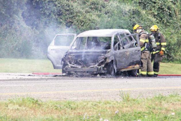 First responders snuff vehicle fire