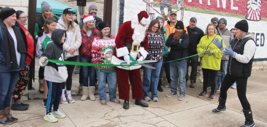 A ribbon cutting ceremony led by none other than Santa occurred Saturday, Dec. 7 for Doublin’ In, an open air event and performance venue located at the corner at Elm and Grafton Streets in downtown Dublin. The venue is owned by Rod and Miles McNeal, with Sarah McNeal-Weaver acting as a booking agent. The affordable venue can be booked through Facebook. Santa’s friends along with members of the Dublin Chamber of Commerce were present for the ceremony. Paul Gaudette | Citizen staff photo