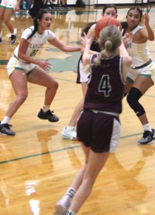 Dublin Lady Lions Emma Vargas and Ingrid Hernandez guard against DeLeon ballcarriers in the Nov. 26 home game. Paul Gaudette | Citizen staff photo