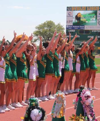 Wyndi Veigel | Citizen staff photo Dublin Cheerleaders join the crowd in the school song at Friday’s community-wide pep rally.
