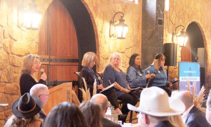 Sara Vanden Berge, owner of Beneath the Surface News, leads a panel discussion on human trafficking at the Cross Timbers Family Services Better Beginnings Brunch Saturday, Jan. 28. The panel included Investigator Sherri Thomson, CTFS Bilingual Advocate Aida “Evie” Monrreal, Chief Nurse Officer of Texas Health Resources Cindy McCarthy and CTFS Counselor Sophia Stice. Wyndi Veigel | Citizen staff photo