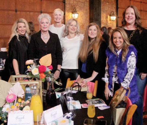 A group of friends enjoys the Better Beginnings Brunch fundraiser hosted by Cross Timbers Family Services. Wyndi Veigel | Citizen staff photo