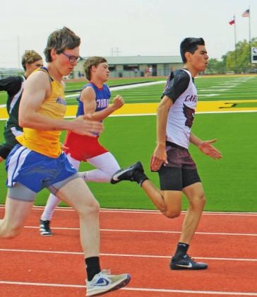 Lingleville’s Alex Carrizales leads a pack of runners during the 1A District track meet held Friday in Dublin. Sara Gann | Citizen staff photo