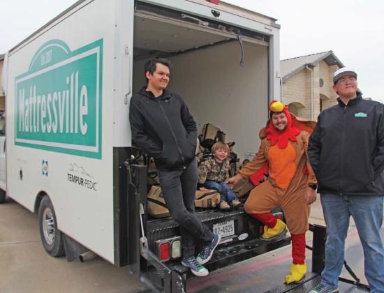 Matressville handed out over 200 pounds of turkey to eager turkey lovers in Stephenville Saturday, Nov. 19. Hundreds braved the cold to get a free turkey to be used in Thanksgiving meals this week. Matressville General Manager Ira Goodman embraced the event by once again donning a turkey costume. Wyndi Veigel | Citizen staff photo