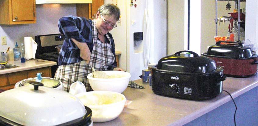 Volunteers with the Church for the Lost and Found made Thanksgiving lunch for Meals on Wheels recipients. Below, delicious food waits to be delivered. Paul Gaudette | Citizen staff photo