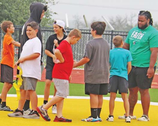 DHS football coaches and players led boys kindergarten-8th grade in exercises and games on Cervetto Field in the annual football camp May 27-29. Paul Gaudette | Citizen staff photos
