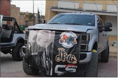 A vehicle displays a photo of Rylan Pruitt, the namesake of the Rylan Strong Network. The nonprofit works to aid the families and kids suffering from childhood cancer. He courageously fought a 10-month cancer battle, and won that fight in his own way, gaining his wings, March 10, 2022. Paul Gaudette | Citizen staff photo