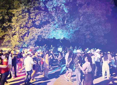 Hundreds attended the dance and concert at the Hispanic Heritage Festival. Below, the Cabalgata Trail Ride arrives at City Park. Courtesy photo