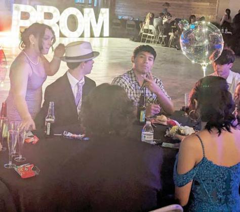Prom goers take a break to catch their breath after dancing. Decor was provided by Dublin’s Inflated Creations. Paul Gaudette | Citizen staff photo