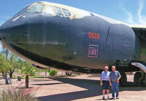Dean Jones and Lt.Col. Bill Bushman standing in front of a B-52, similar to the plane they flew in when running a mission in Guam