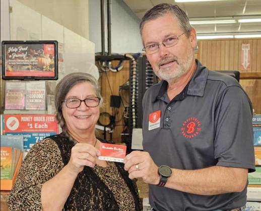 Brenda Smith was recently presented with a $100 gift card by Brookshire Brothers manager Michael Beard as part of the chain’s giveaway being hosted throughout the holiday season. Every week, 25 Celebrate Rewards members are picked at random to receive a $100 gift card. No purchase is necessary to be eligible to win. Recipients simply need to be a Celebrate Rewards member to be in the drawing. More information can be found on the store’s website, brookshirebrothers.com. | Submitted photo